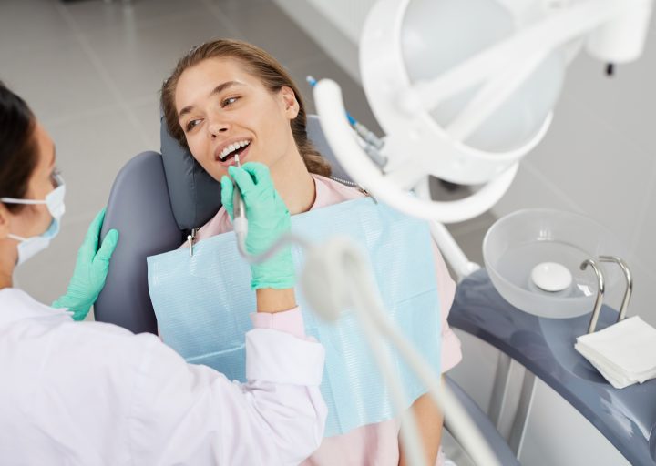 young-woman-at-dental-exam.jpg young-woman-at-dental-exam.jpg